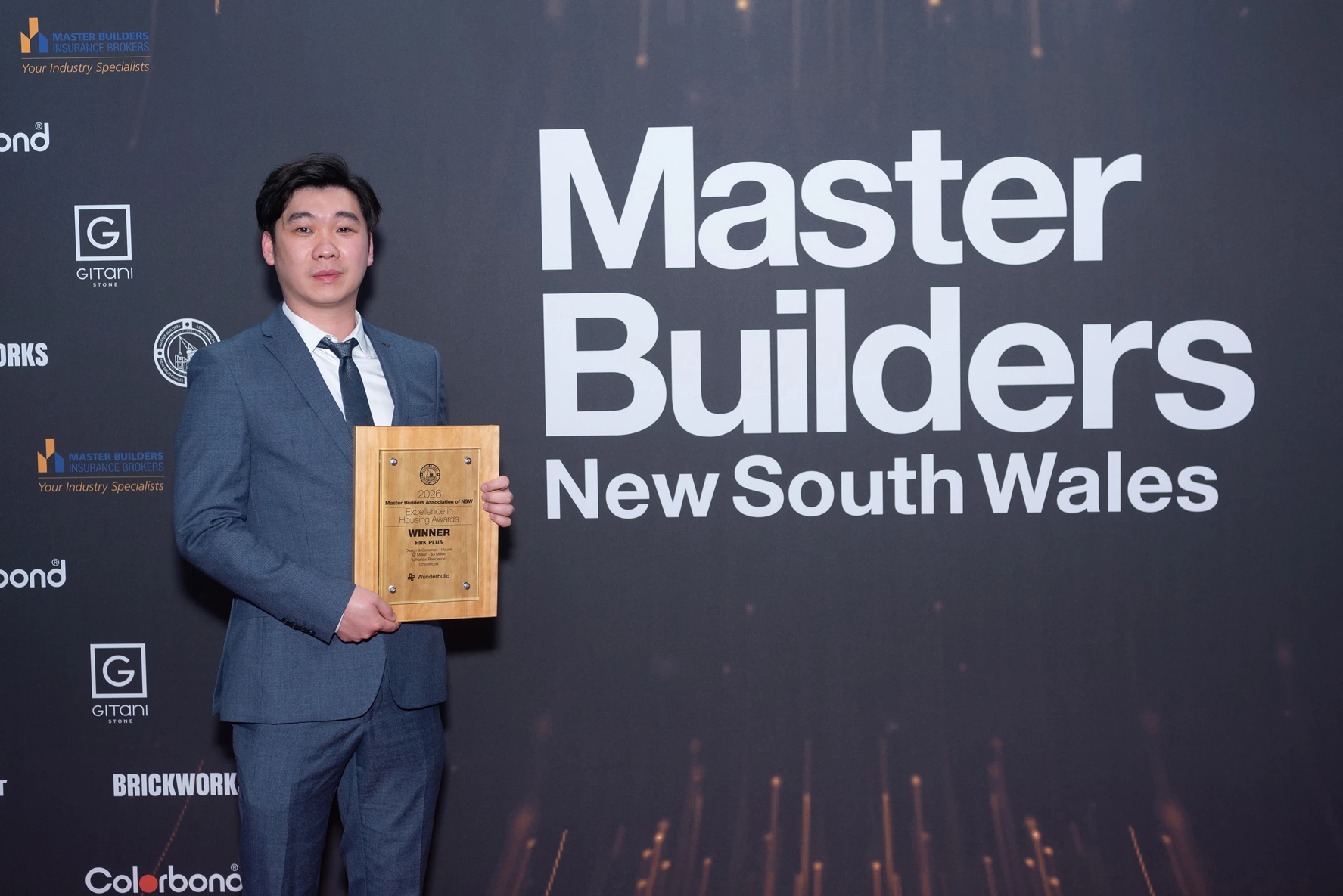 HRK+ award recipient with the Master Builders NSW winning plaque