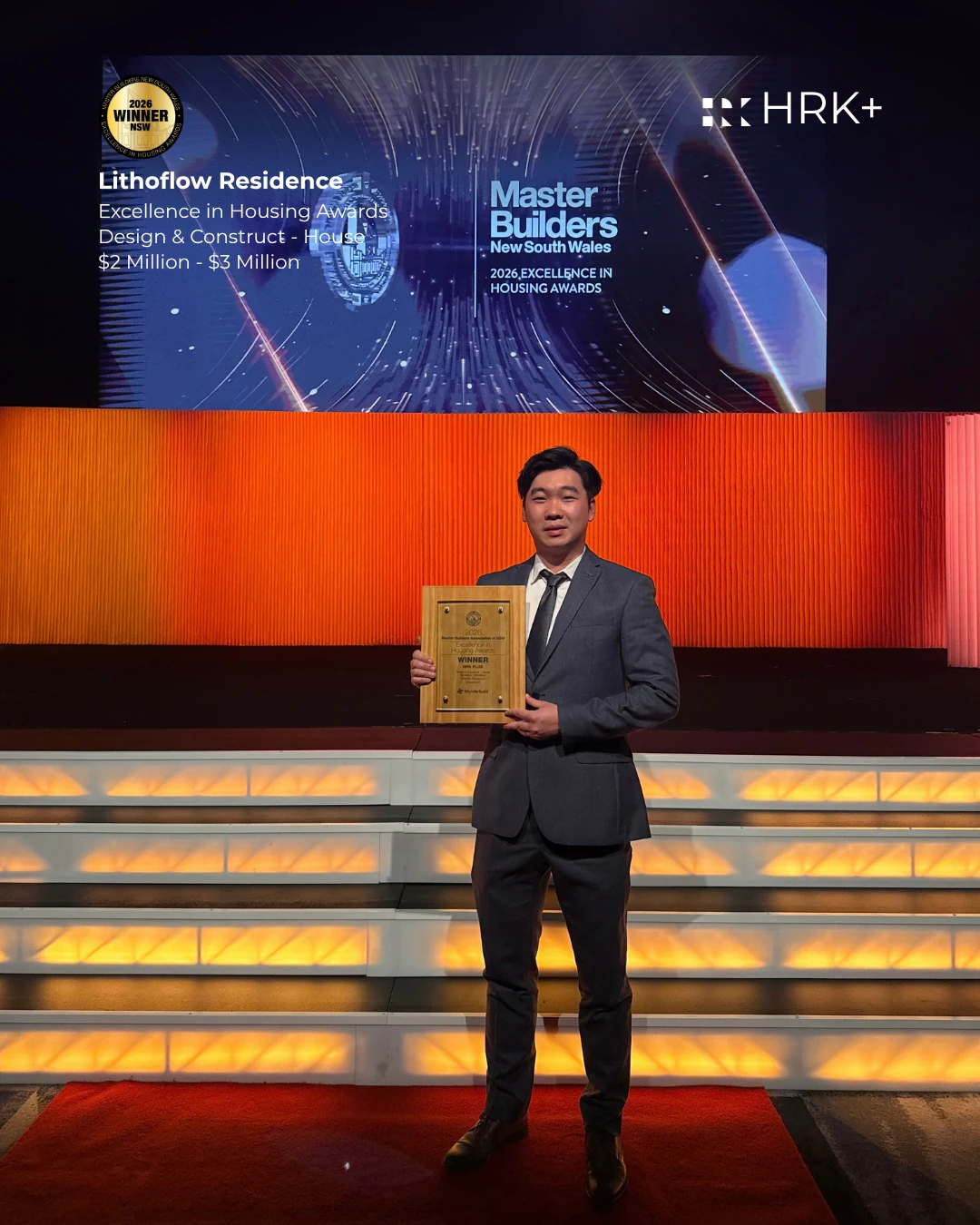 HRK+ accepts the award on stage