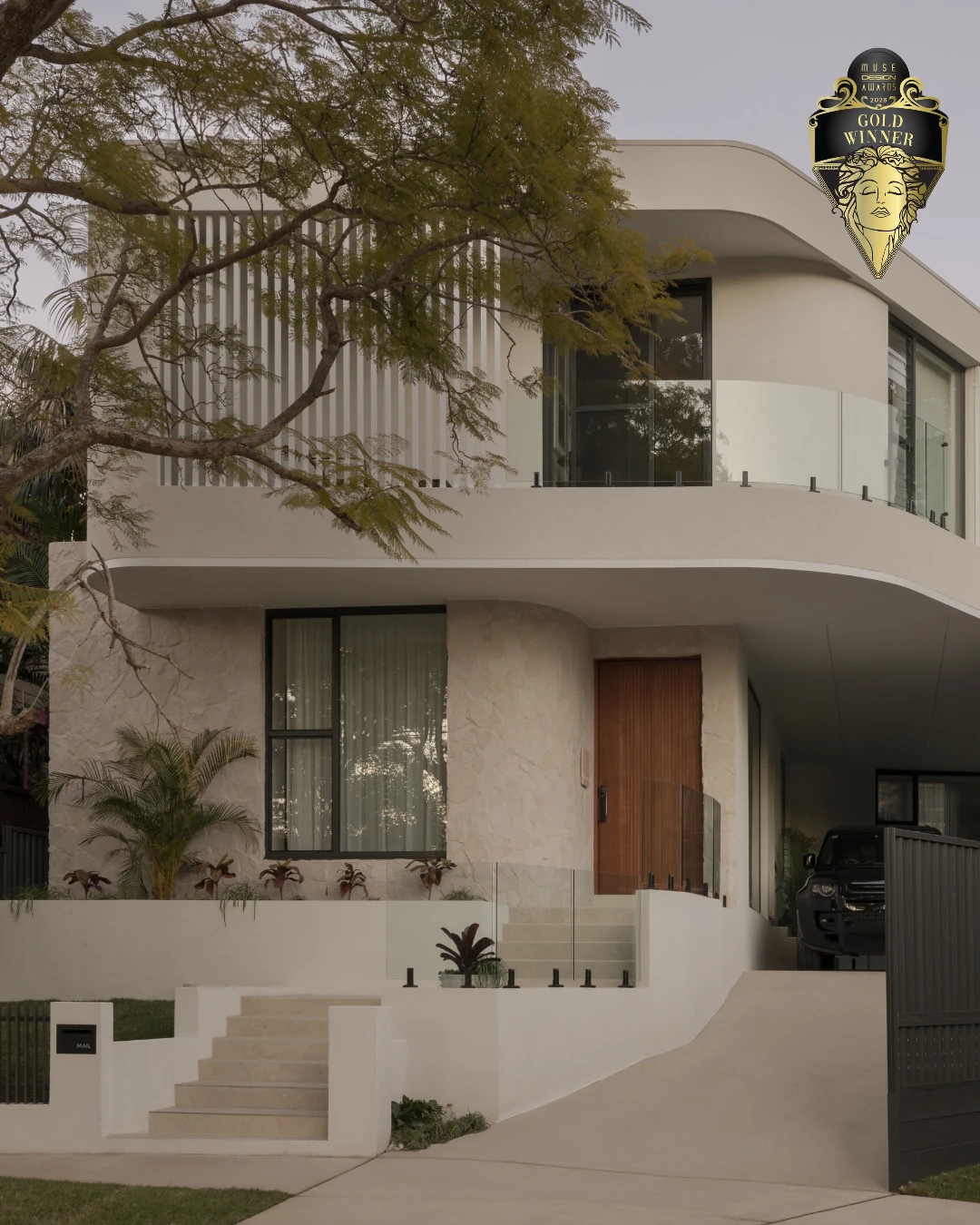 The Elia facade with curved balconies and planted edges